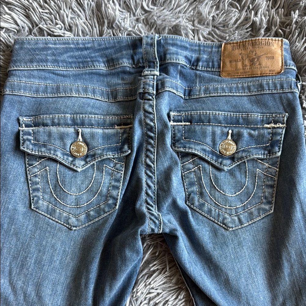 True Religion Blue Jeans with Classic Medium-Wash and Lived-In Look